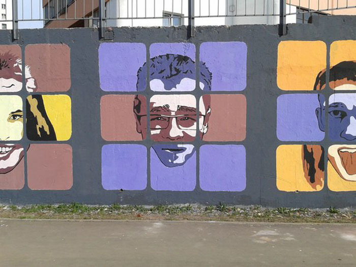 Портреты на стене по улице Шугаева
